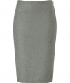 Luxe basics anchor any modern wardrobe, and Ralph Laurens anthracite wool stretch skirt proves an elegant indispensable - Medium rise, curve-contouring pencil cut hits at knee - Decorative seams and two kick pleats at rear - Zips at side - Polished and classically chic, seamlessly transitions from the office to evenings out - Pair with a silk blouse, blazer and pumps, or with a cashmere pullover, leather jacket and ankle booties