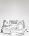 MARC BY MARC JACOBS' chicly sized leather crossbody is a precious take on metals. An easy option for day or night, this silvery bag shines against an all-black palette.