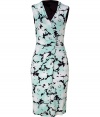 Luxe sleeveless dress in fine, viscose jersey stretch blend - Elegant mint and black color combination - Feminine floral motif - Slim silhouette tapers gently at waist - Wrap-style pencil skirt hits just above the knee - Fitted bodice with ruched waist and V-neck - Polished style is perfect for parties, cocktails and evenings out - Pair with sandals and a light cardigan or style with open-toe pumps and a cropped leather jacket