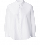 With a pristine look and contemporary cut, Jil Sanders white cotton shirt is an effortless chic choice - Classic collar, 3/4 sleeves, buttoned cuffs, button-down front, shirttail hemline - Loose fit - Wear over slim-fit separates with sleek leather flats