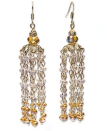 A luxurious look. Elegant champagne-colored glass rondelle beading adorns these chic tassel earrings from c.A.K.e. by Ali Khan. Crafted in mixed metal, they'll stand out as an eye-catching addition to your outfit (whether for day or evening). Approximate drop: 3-1/2 inches.