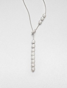 An elegant piece with lustrous Akoya pearls accented with dazzling diamonds on a delicate 18k white gold link chain. 7mm white Akoya pearlsDiamonds, .2 tcw18k white goldLength, about 19Lobster clasp closureImported 