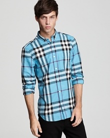 Burberry's essential button-down rendered in a rich check pattern and slim fit.