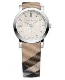 This Burberry watch features a Nova Check fabric strap and round stainless steel case. Silvertone engraved dial with silvertone stick indices, logo and date window. Swiss made. Swiss movement. Water resistant to 50 meters. Two-year limited warranty.