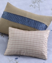 A beautiful, richly-textured Silk Plaid Organza Pillow enhances the feeling of a elegant, restful environment. A removable envelope sham allows for easy cleaning. Pillow plumped with polyester fiberfill.