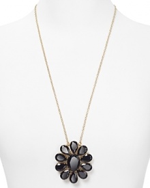 Put the petal to the metal. This kate spade new york piece bedecks the neck in floral inspiration, cast in plated gold with a retro-modern stone pendant.