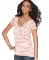 This soft cotton tee from DKNY Jeans features heathered stripes and an asymmetrical hem for a trend-forward, casual look.