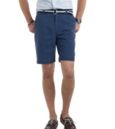 With a sporty striped belt, these flat-front shorts from Izod give you a polished look while still keeping you comfortable.