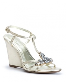 These elegant Calvin Klein evening sandals, with cutting-edge crystal embellishments, will let you dance the entire night away thanks to wearable wedge heels.