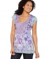 One World's floral tunic features a feminine lace yoke and a tiered hem. Studs give it just the right amount of edge!