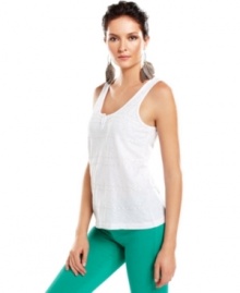 The tank top gets an edgy update in this look from Calvin Klein Jeans, featuring tonal paillettes at the front. Pair it with colored jeans for downtown style!