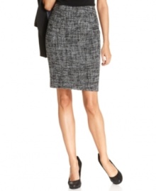 The fabric of the fall season, textural tweed, lends a fresh look to your office wardrobe. Calvin Klein's pencil skirt pairs perfectly with tailored jackets, soft blouses and elegant sweater sets.