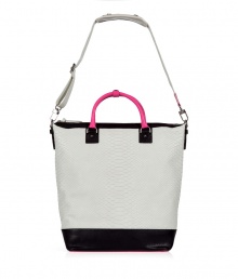 Sporty, structured handbag in fine python-print leather - Trendy pink accent and black trim - Square shape is spacious and roomy enough for small purchases and day-to-day essentials - Two short carrying handles, adjustable and removable shoulder strap - Interior zippered pocket - Great daytime accessory with skinny jeans, silk blouse and stiletto ankle boots