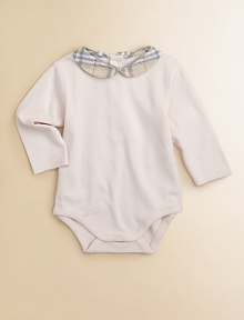 A charming Peter Pan collar of woven checks turns a basic bodysuit into a pretty layer under a jumper, skirt or leggings.Woven Peter Pan collarBack button placketLong sleevesSnap bottomCottonMachine washImported Please note: Number of buttons may vary depending on size ordered. 