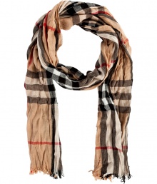 Finish your look on an iconic note with Burberry Londons checked scarf, detailed in super soft crinkled merino-cashmere for luxuriously laid-back results - Frayed ends - Wear inside over bright knit sweaters, or outdoors over classic coats with leather gloves