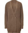 Raise the bar on modern essentials with Closeds elegant walnut brown long cardigan - Larger weave, acrylic and wool knit - Double breasted cut with deep v-neck and two rows of buttons - Single pocket at left hip - Rib trim at cuffs and hem - Cardigan hits mid-thigh -  Slim, straight silhouette - Casually chic, perfect for pairing with skinny denim, pencil skirts and cigarette pants