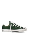 Go green with these classic Converse sneakers featuring a the quintessential All Stars rubber sole with sporty black stripes.