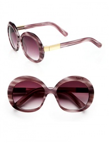 Inspired by the style icon, Jackie O, these round acetate shades feature a beveled matte gold temple. Available in shiny purple horn with brown gradient lens or shiny black with black mono lens.Beveled and matte gold metal temples100% UV protectionImported