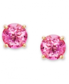 Pretty pink sparklers. Victoria Townsend's petite stud earrings pack a sparkling punch with round-cut pink topaz (3 ct. t.w.) set in 18k gold over sterling silver. Approximate diameter: 1/4 inch.