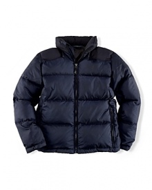 Crafted from quilted, microfiber ripstop for increased protection against wear and tear, the Ralph Lauren Boys' Ascent jacket is stuffed with a thick down filling for lightweight warmth.