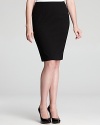 A workweek essential, this Eileen Fisher Plus pencil skirt touts a hint of stretch for a slimming, sleek silhouette. Polish it off with classic pumps and rise to new heights of office chic.