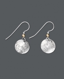 Embrace exquisite design with these clever drop earrings by Jody Coyote. Disc surface features a hammered design in sterling silver with an antique gold tone mixed metal accent bead. Approximate drop: 1-1/8 inches.