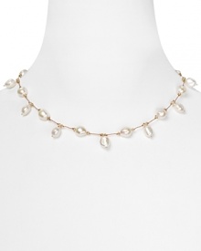 Margo Morrison's freshwater pearl necklace is a delicate detail. Designed to melt into the skin, this feminine piece will work just as well during the day as at night.