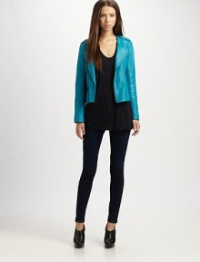 Rich lambskin takes on a metallic sheen in this cropped jacket styled easy-fit stretch panels.Foldover lapelAsymmetrical front zipperZip pocketsZip cuffsBack zip-ventAbout 20 from shoulder to hemBody: leather; panels: 68% rayon/27% nylon/5% spandexDry cleanImportedModel shown is 5'9 (175cm) wearing US size Small.