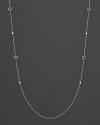 Diamonds and London blue topaz dot a sterling silver chain. By Ippolita.