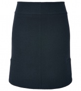 Cut an exquisitely feminine figure in Veronique Leroys navy wool skirt, tailored to perfection with a sweetly flared hemline - Hidden back zip, form-fitting - Pair with breezy tops and shimmering fine jewelry