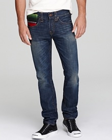 True Religion introduces a splash of color on the front and back of these slim, straight fitting jeans, a welcome interruption in the world of straightforward denim.