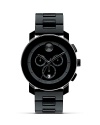 Large Movado BOLD chronograph watch with black dial with black accents and deployment bracelet.