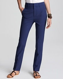 Vibrant Vince cobalt pants replace denim styles for a fresh look this season. Buttons at the back cuffs lend a chic element to the modern must-haves.