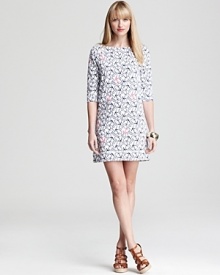 A jaunty anchor motif lends nautical charm to this sleek Lilly Pulitzer dress. Team with crisp red accents and watch the pattern pop.