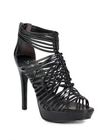 THE LOOKOpen toeStrappy, woven cage styleBack zipTHE FITSelf-covered heel, 4¼ (110mm)Self-covered platform, ¾ (20mm)Compares to a 3½ heel (90mm)THE MATERIALLeather lining and sole Padded insoleORIGINImportedOUR FIT MODEL RECOMMENDS ordering one half size up as this style runs small. 