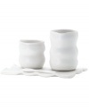 Look and feel. The purity of white china and natural texture beloved by Donna Karan make the Porcelain Touch sugar and creamer set a brilliant addition to modern tables. With tray and spoon.