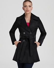 Pleating lends movement and feminine flair to this double-breasted trench from Via Spiga.