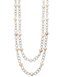 A long, luxurious layer. Pink and white cultured freshwater pearls (9-11 mm) adorn this oval link chain in polished sterling silver. Approximate length: 72 inches.