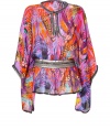 Ultra-luxe caftan in fine, pure multicolor printed silk - Incredibly soft, lightweight material drapes beautifully - Vibrant, pink, purple and orange print positively pops - Round neck with key hole detail and wide, dolman sleeves - Waist-cinching metallic belt and decorative trim - Sexy and eye-catching, perfect for the beach, parties or your next island getaway - Pair with skinny denim or a bikini and open-toe sandals or wedges