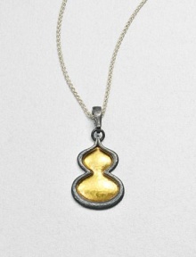 An elegant style featuring hammered 24k gold framed with darkened sterling silver on a link chain. Sterling silver24k goldLength, about 17.7Pendant size, about 1Lobster clasp closureImported 