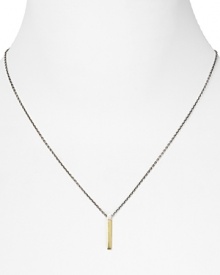 Elizabeth and James' shapely two-tone pendant finds a contemporary way to express classic glamour. Teamed with jersey basics, it will bring an edge to your ingenue uniform.