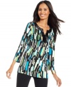 JM Collection adds some sparkle to a graphic-print tunic with a neckline full of sequins!