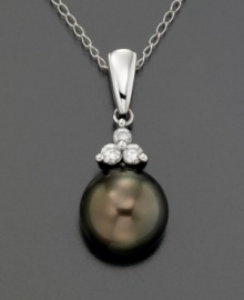 Gleaming Tahitian pearl (8 mm) is brilliantly offset by the sparkle of diamond accents and the cool shine of 14k white gold. Chain measures 18 inches