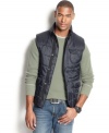 A zip up vest that keeps you warm while you stay cool: Ecko Unltd's sleeveless puffer with zipper-and-snap front and three snap-flap pockets.