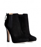 A sleek and versatile choice for day to evening looks, Diane von Furstenbergs suede ankle boots lend a contemporary-chic polish to any outfit - Round toe, elasticized inserts at sides, lace-up back, hidden wafer platform, boxcalf covered tapered blocky heel, rubber insert on sole for traction - Ankle height - Wear with everything from tees and leggings to tailored sheaths and leather jackets