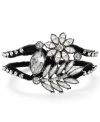 Art Deco appeal. Vintage design serves as intriguing inspiration for Betsey Johnson's exquisite crystal flower bracelet. Featuring faceted crystals and a black grosgrain ribbon, it's crafted in hematite tone mixed metal. Approximate length: 8 inches.