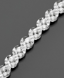 A brilliant diamond bracelet for your wrist. This extraordinary bracelet features diamonds (3 ct. t.w.) cast in 14k white gold in a beautiful rope pattern. Measures 7 1/2 long.