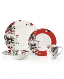 Shades of gray rain down on Floral Confetti dinnerware in a fresh, spot-on pattern from Mikasa's collection of place settings. Bright red accents and a glossy finish make the already-bold graphic pop against modern shapes. In easy-care porcelain for effortless everyday style.