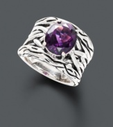 Brilliant color meets inspired design. Chic ring by the Effy Collection features a vibrant oval-cut amethyst (4-1/10 ct. t.w.) sitting in an intricately woven basket of sterling silver. Size 7.