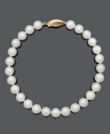 Channel classic style and beauty with a simple strand of pearls. Bracelet features AA Akoya cultured pearls (6-1/2-7 mm) with a 14k gold clasp. Approximate length: 8 inches.